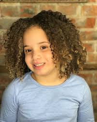 Black girls with unruly hair will love this amazing hairstyle since it will take all the hair maintenance out of their lives. 19 Cutest Hairstyles For Curly Hair Girls Little Girls Toddlers Kids