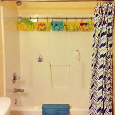 Never Thought About Saving Space By Putting In An Extra Shower Rod To Hold Bins For Bath Toys Bathroom Shower Organization Shower Storage Shower Organization