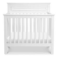 The Space Saving Design Of The Autumn 4 In 1 Convertible Mini Crib Will Bring Both Delight And A Touch Of Traditional Appeal T Mini Crib Cribs Convertible Crib