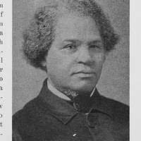 Studio portrait of a man.]