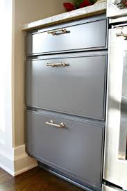 Gently wash your cabinets with a damp rag to remove any dust that was created from sanding them down. The Painted Cabinets A Month Later From Thrifty Decor Chick