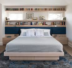 Wall of storage around the mantel. Room Of The Day Built Ins Boost Storage In A Master Bedroom