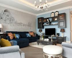 عايز تغير فى ديكورات شقتك بشكل كبير و بطريقة بسيطة اوى ارسم لوحة على حائط واحد من الغر Popular Living Room Colors Yellow Living Room Living Room Wall Color