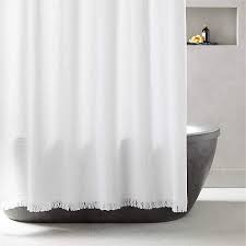 With 12 sturdy buttonholes at its top, the curtain is easy to hang on your shower rod using any hooks or rings. Meilan White Waffle Shower Curtain Cb2