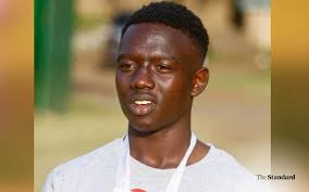 Julius Mwangi Kamuru, a landlord, pleads with the driver of the bulldozer  to stop the demolitions. Photo: Moses Omusula/Standard