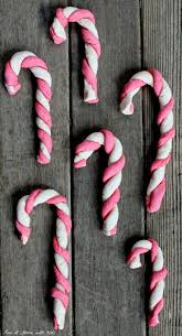 Spray the inside of each cookie cutter with cooking spray and set them on a cookie sheet lined with either parchment paper or a silicone baking mat. 14 Diy Candy Cane Christmas Crafts To Repeat Shelterness