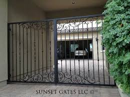 Black is used for the gate and fence combi to better make it stand out and. Sunset Gates Gallery Sunset Gates Modern Main Gate Designs Iron Gate Design Main Gate Design