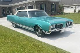 Image result for Turquoise 1960 Oldsmobile