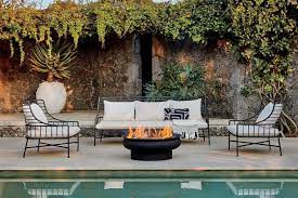 W x 24.6 in h square steel uv printed propane rustic wood oil rubbed bronze look fire pit base 50k btu burner are exclusive to the home depot. 10 Best Fire Pits Under 350 In 2021 Affordable Outdoor Fire Pits For Your Backyard Hgtv