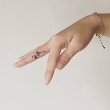 Cross tattoos may be inked for various personal reasons. 1001 Beautiful Finger Tattoo Ideas And Their Meaning