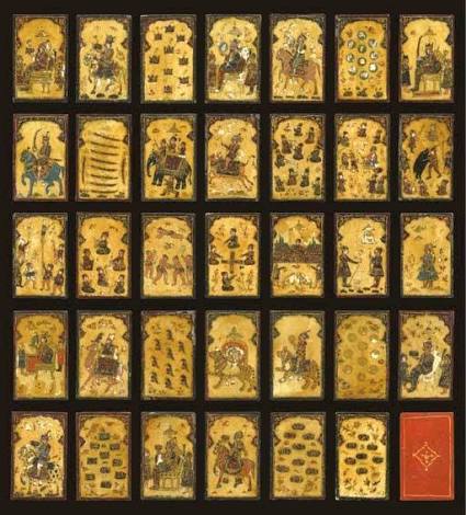Rajput men playing the game of Puchesee - 1860s A print by Eugene Clutterbuck Impey in the early 1860s showing a group of men from Rajasthan in northern India playing pachisi. This