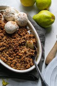 Pears halved in baking dish red anjou . Easy Pear Ginger Crisp Made With Whole Wheat Flour
