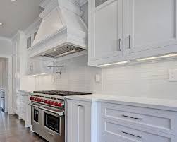 I know the 1/2 offset/brick layout is the standard approach with subway tile but, am i crazy to think that 1/3 is also used? Herringbone White Glass Tile Backsplash Novocom Top