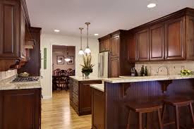 This lovely wooden kitchen has a dark hardwood this kitchen has plenty of windows for the natural light to glimmer off of the polished wooden floors. 75 Beautiful Purple Kitchen With Dark Wood Cabinets Pictures Ideas June 2021 Houzz