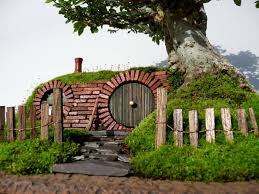 A Large Hill The Hill Lay To The North And Under Its Southern Slopes Bilbo S Father Bungo Built The Luxurious Smial Bag End Hobbit House The Hobbit Bonsai