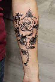 A very tiny small rose tattoo on wrist of girl. Estudio De Tatuajes Barcelona Siha Tattoo Workink Class Since 2010 Tribal Rose Tattoos Tattoos Vine Tattoos