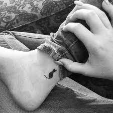 Which Subtle Tattoo Should You Get Based On Your Zodiac Sign Black Cat Tattoos Cat Tattoo Black Cat Tattoo Designs