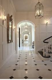 Black And White Marble Floor With The White Walls And Trim Work Perfectly Timeless White Marble Floor Marble Flooring Design Black And White Hallway