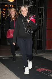 What is done in bebe rexha without makeup? Bebe Rexha Cradles Her Pup As She Steps Out Makeup Free Wearing A Black Sweatshirt And