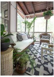 9 Essentials For A Stylish Cozy Screened Porch Screened In Porches Cozy Home Screened Porch Decorating Outdoor Living Rooms Screened In Porch Furniture