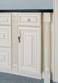A perfect way to add style to your bathroom cabinet layout. Home Cabinet Westbury Creme Maple Glazed Decorative Post Fluted Filler Rosette Block Glazed Kitchen Cabinets Decor Shelf Styling