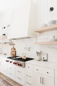 Take a look at the white ice backsplash design for your quartz countertop. 11 Fresh Kitchen Backsplash Ideas For White Cabinets