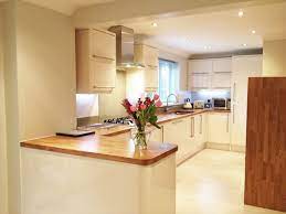 Blackboard above sink wooden worktop cream via. Modern Kitchen Norwich With Cream Units And Oak Worktops Norwich Norfolk Kitchen And Bathroom Designs Cream Gloss Kitchen Home Decor Kitchen Gloss Kitchen