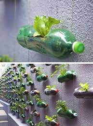 Affordable garden edging with upcycled plastic bottles. How To Recycle Plastic Bottles For Outdoor Home Decorating And Garden Design