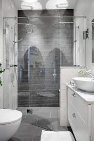 The mirror at the back of the alcove adds depth. Stockholm Vitt Interior Design Grey Bathroom Small Master Bathroom Bathroom Remodel Master Bathrooms Remodel