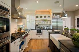 Off white kitchen cabinets is an excellent choice to pick when you love a white color to dominate your cooking area, but at the same time, you don't want it to look too bright. Kitchen With Antique White Cabinets And Black Island With White Farmhouse Sink Traditional Kitchen Boston By Columbia Cabinets Houzz