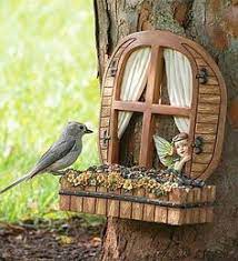 Cute And Weird Bird Feeder Reminds Me Of The Faraway Tree Fairy Garden Houses Miniature Fairy Gardens My Fairy Garden