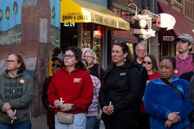 See photos as Iowa City residents host a vigil for shooting victims