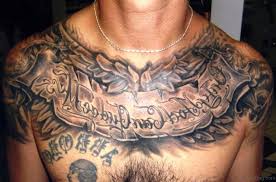 Eagle chest tattoo ideas for men which is looking very adorable with arrow tattoos on lower chest. 50 Fantastic Chest Tattoos For Men