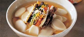 Celebrate The Korean New Year Korean Traditional Food Beef Soup Recipes Korean Rice Cake Soup