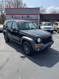 Image result for Brilliant Black 2003 Jeep