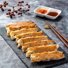 現點現煎、金黃酥脆的招牌鍋貼
