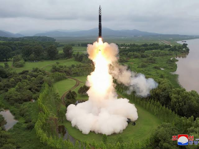 A plume of smoke rises from a North Korean missile launch site as regional tensions continue to escalate.