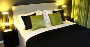 Grey And Lime Green Bedding Shades Of Grey Are Accented With Lime Green A Bold Charcoal Grey Lime Green Bedrooms Bedroom Green Bedroom Interior