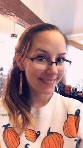 Handmade doll in purple velvet outfit