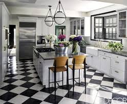 It's a perfect complement to the converted barn's warm wood tones. House Tour A Paris Apartment Brimming With Architectural Gems Interior Design Kitchen Kitchen Interior Marble Kitchen Island