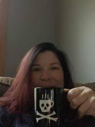 My first coffee mug! It's not finished yet. I have lots more to add. I want  it to dry so I don't smudge. The black n white is my guide picture.