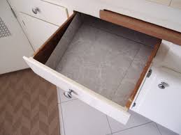 vinyl tiles in kitchen drawers help. i