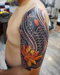 30 koi fish tattoo designs and the meaning behind them in 2021 koi fish tattoo koi tattoo sleeve koi fish tattoo forearm