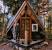 Winter Small Cabin In The Woods