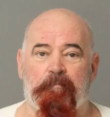 Masked North Carolina man chillingly handed ex-wife a bouquet of flowers  before ruthlessly gunning down her partner and a cop