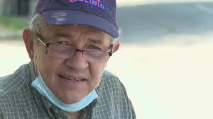 What happened to the building sign atop the Garfield Theater?