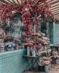 Move into the fast lane and exhibit your wild side with this classic combination made up of fresh blue irises and white lilies that will set their pulses racing. Wild At Heart Flower Shop In London England Flowers London London Wild Hearts