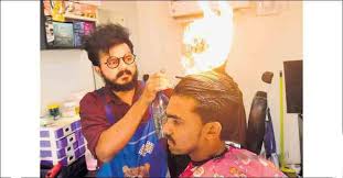 This helps the stylist see your true hair (wavy, straight, etc.) in order to determine the best cut for you. He Set Dozens Of Heads On Fire And Got Away With It Fire Haircut Fire Styling Hair Using Fire Beauty And Fashion Lifestyle News