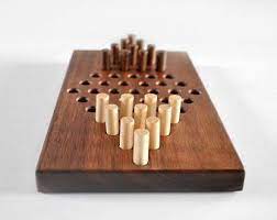 Vintage 1987 lot wood peg puzzle golf tee cracker barrel style puzzles teasers. Peg Solitaire Cracker Barrel Game Last Man Standing Peg Game Graduation Gift Father S Day Gift Brain Teaser Escape Room Puzzle Wood Games Wooden Games Wooden Board Games