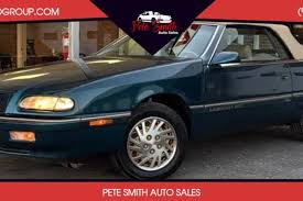 Image result for Light Rosewood 1995 Chrysler